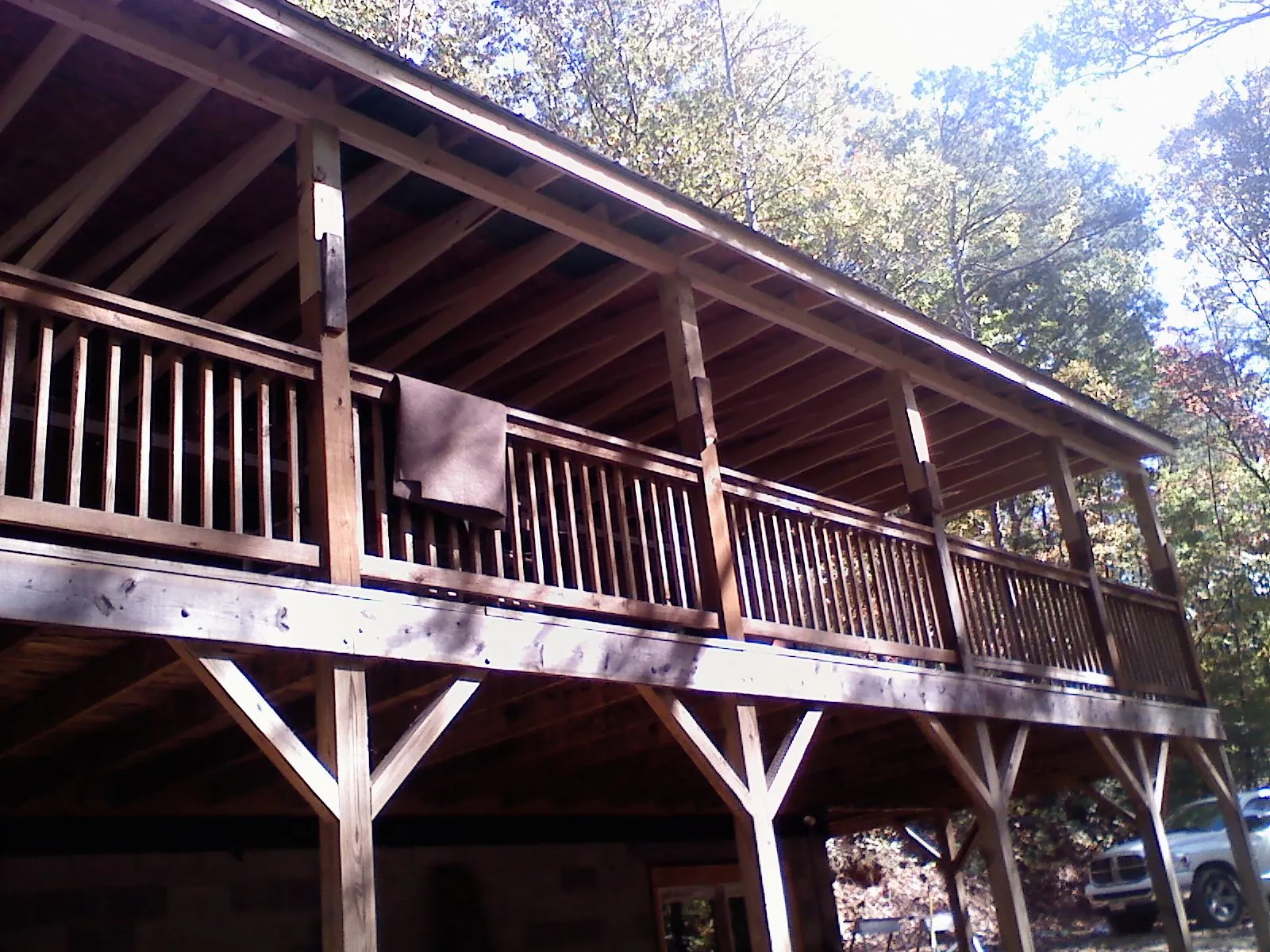 Timber framing under a new elevated porch and deck — Roof Leak Repair in Andrews Air Force Base by Roofing Brothers